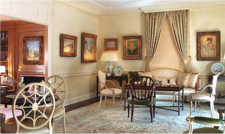 The living room in the home of Henry and Marion Bloch in Mission, Kansas, showing some of their collection of Impressionists. The Degas pastel of a ballerina is above the sofa to the left.